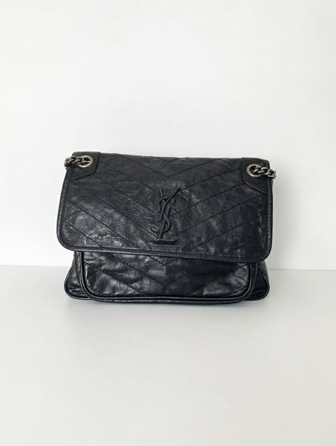 Black quilted YSL bag: