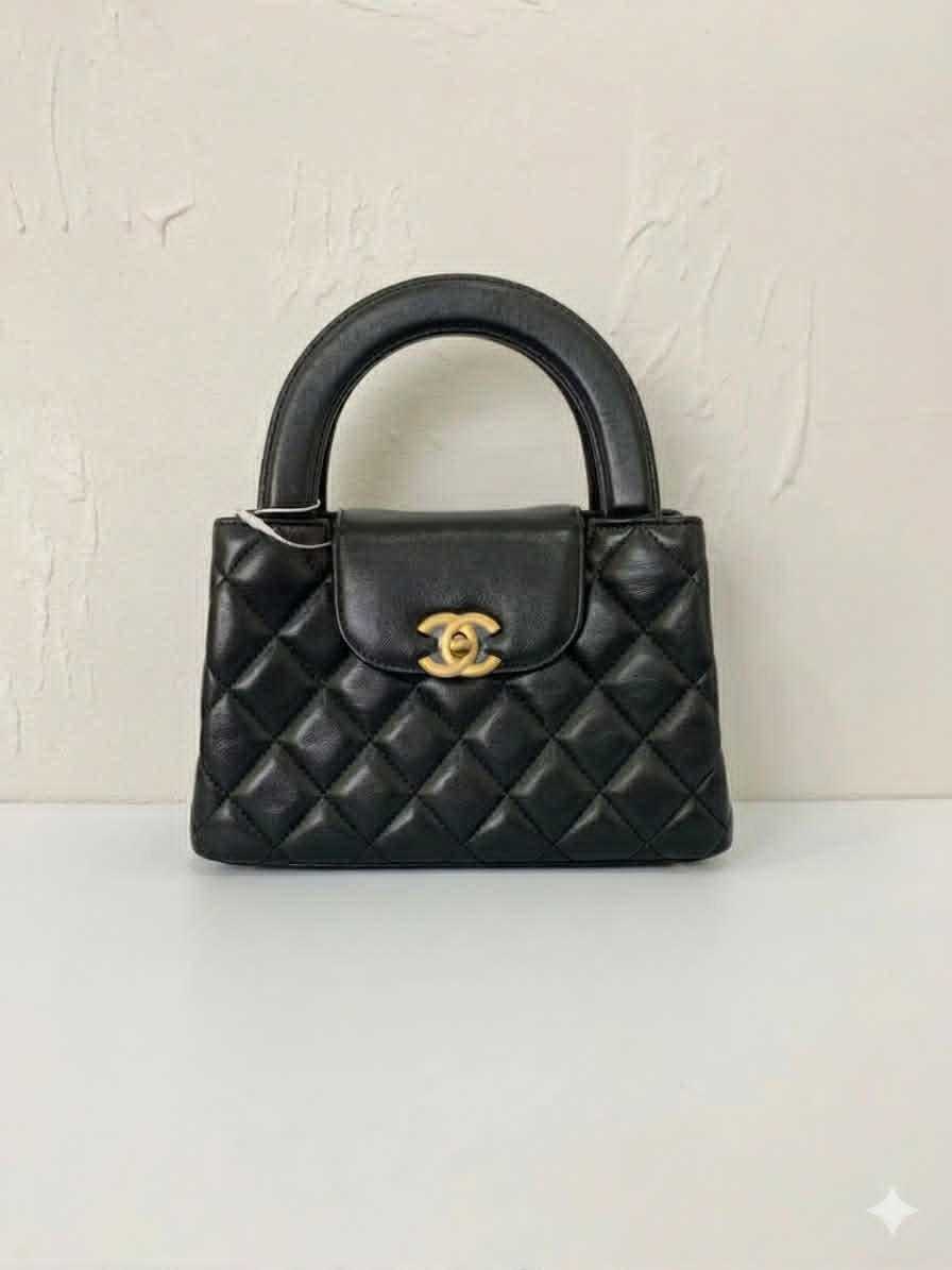 Chanel 25A Kelly in Black and Gold
